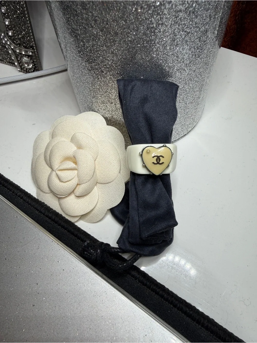 CHANEL Vintage Black Resin Ring with Ivory Heart Camellia Accent